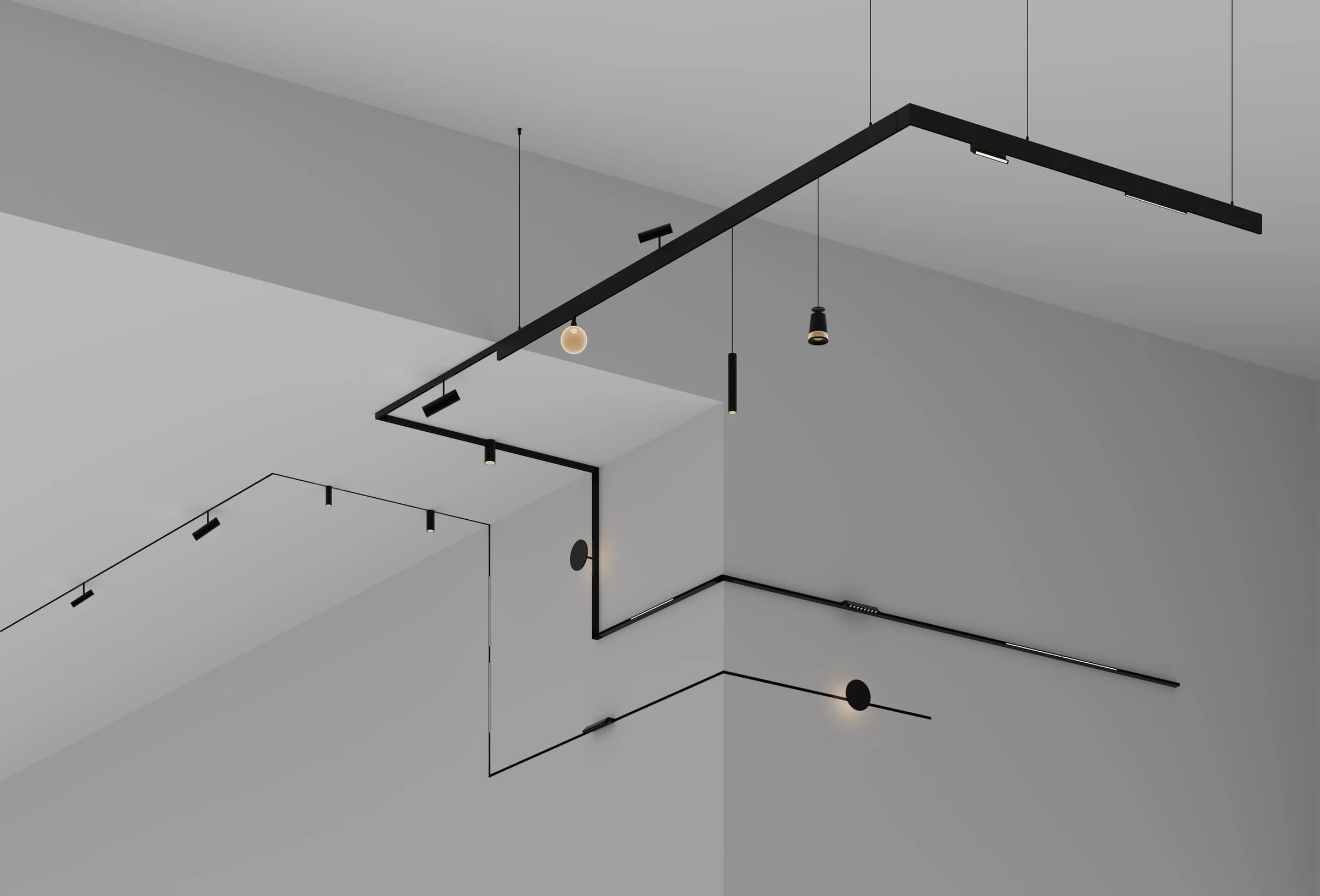 Toast magnetic track system with geometric black rail configuration and pendant lights